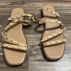 A New Day nude and silver studded sandals in size 9.5